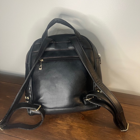 A Fashion inspired  Medium Studded Pebbled Vegan Leather Backpack - Picture 7 of 8